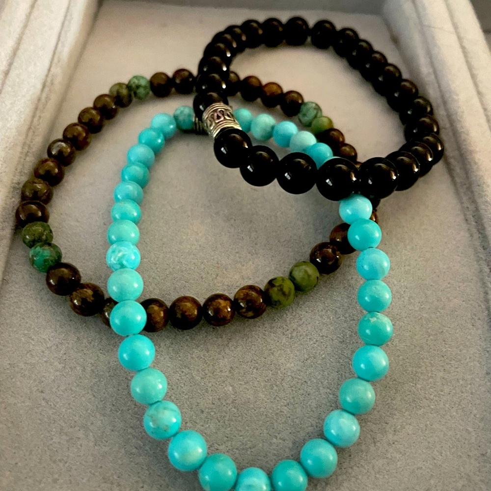 Men’s stretch gemstone bracelets.